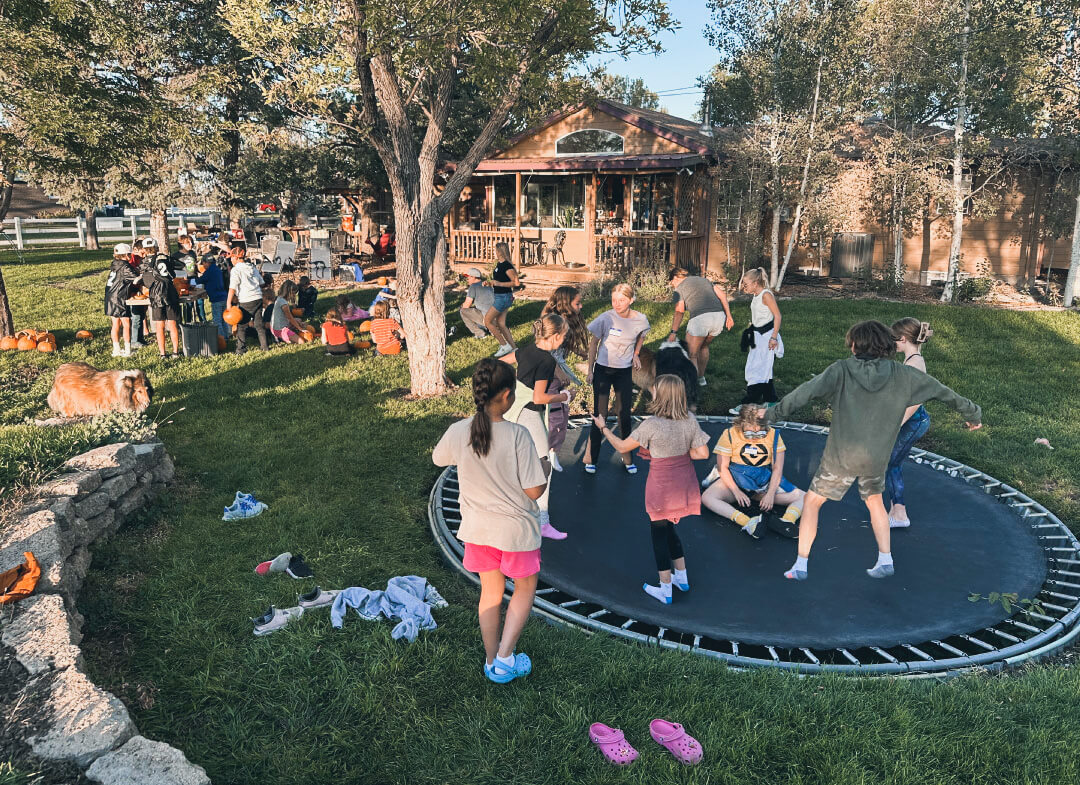 middle-schoolers-jumping-on-trampoline